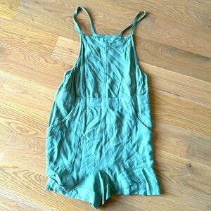 It is a girls sage green romper. Only worn once, washed and in perfect condition